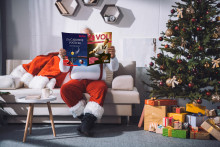 &lt;p&gt;obscured viewof santa claus reading business newspaper while sitting on sofa&lt;/p&gt;